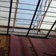 Фото читателя 24.kg. Ветер повредил крышу Дворца спорта в Бишкеке